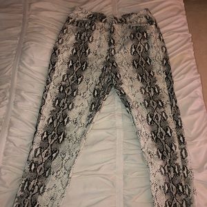 Revolve snakeskin denim pants